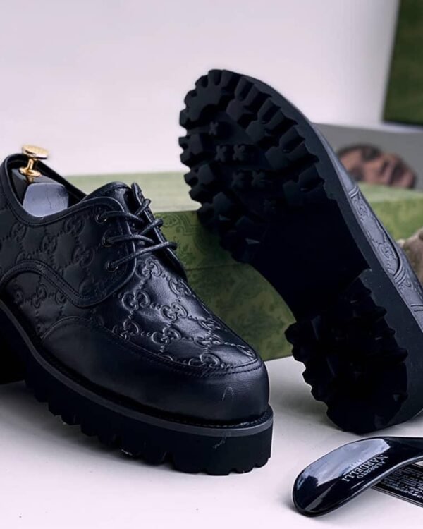 Black GG Monogram Leather Loafers