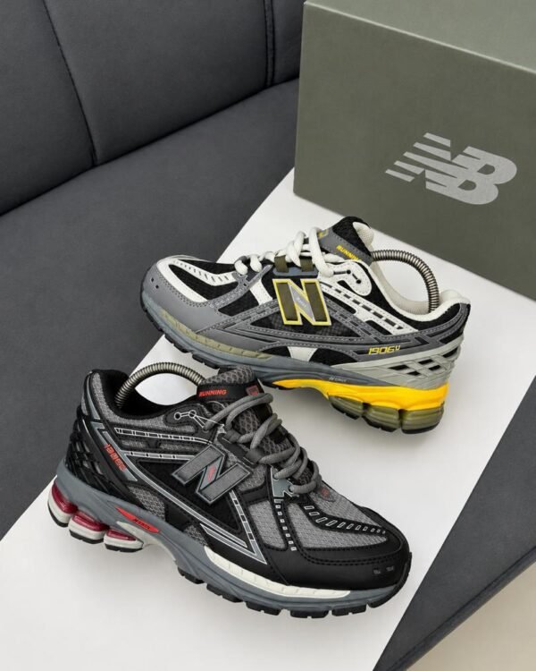 Black Mesh Sneakers Red Heel And Midsole Accents